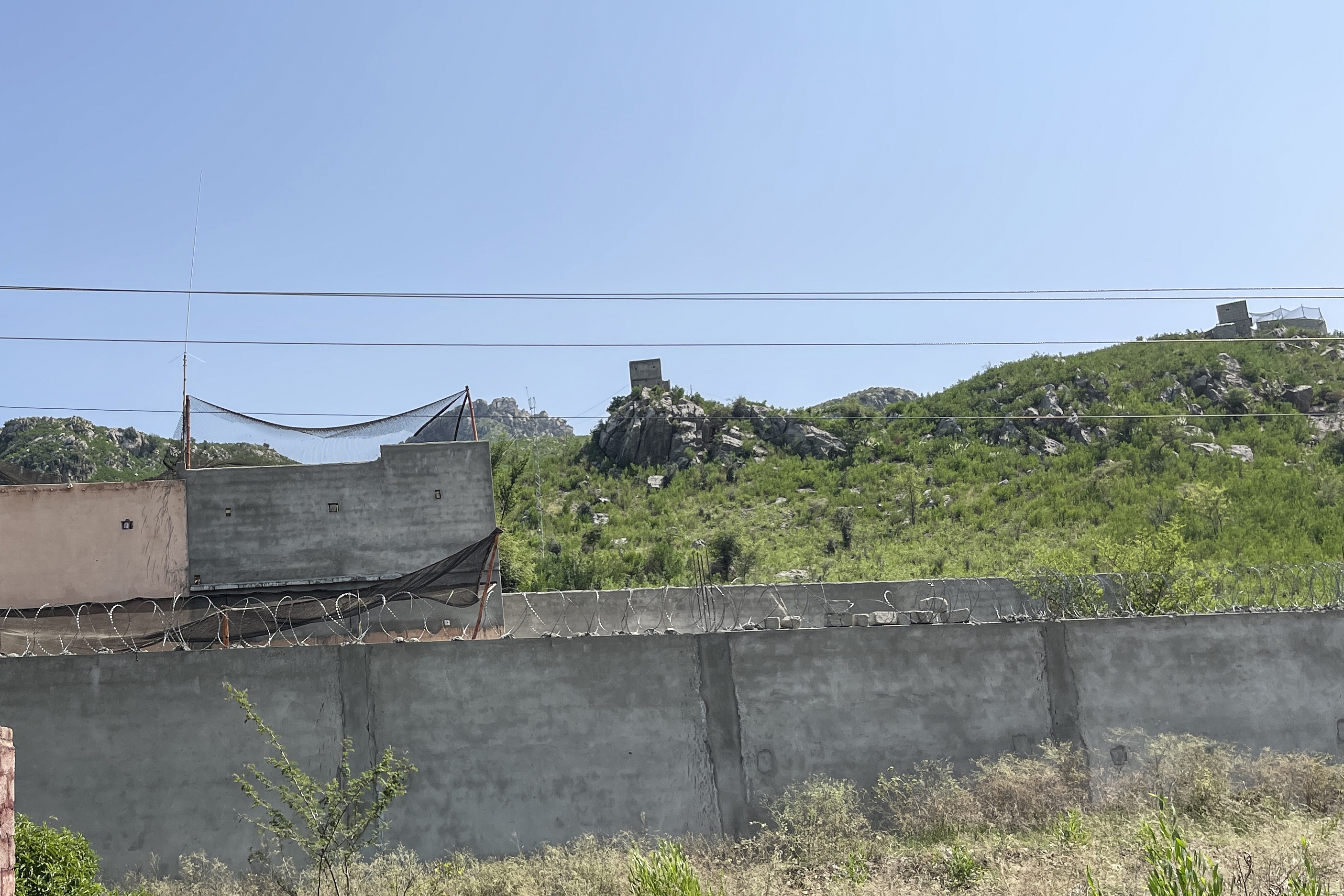 Fishing nets are stretched over and around a police checkpost as a protective barrier in Hangu district, Khyber Pakhtunkhwa, Pakistan, September 26, 2026. Photo: Manzoor Khan