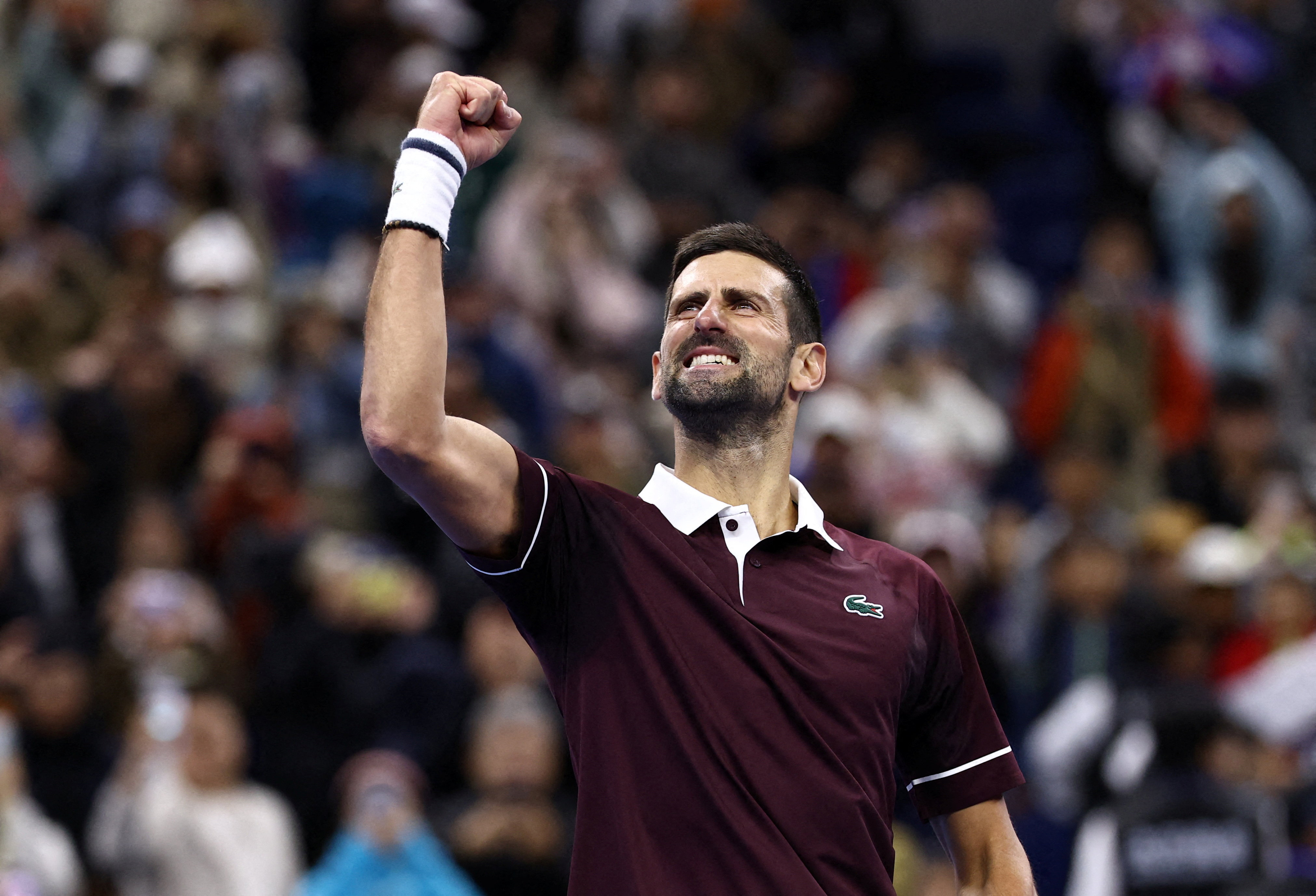 Tennis - China Open - National Tennis Center, Beijing, China - October 4, 2026 Serbia's Novak Djokovic celebrates after winning his quarterfinal match against Germany's Alexander Zverev REUTERS/Tingshu Wang TPX IMAGES OF THE DAY