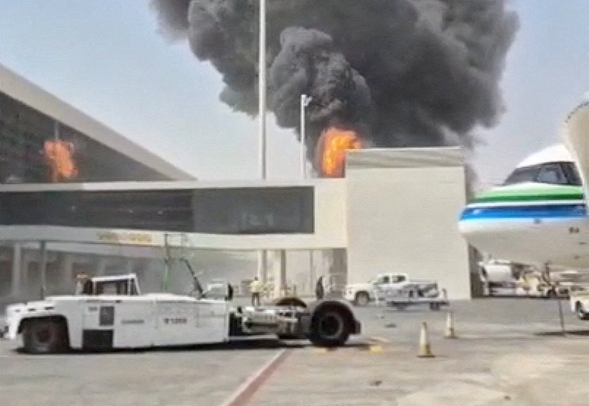 FILE PHOTO: Smoke and flames rise from King Khalid Airport, after Yemen's Iran-backed Houthis said they attacked the airport, in Riyadh, Saudi Arabia, October 8, 2026, in this screengrab obtained from a social media video. Social Media/via REUTERS THIS IMAGE HAS BEEN SUPPLIED BY A THIRD PARTY. NO RESALES. NO ARCHIVES. NEWS USE ONLY. BEST QUALITY AVAILABLE. Verification lines: The location was verified as Riyadh, Saudi Arabia, from the airport buildings, light poles, and painted tarmac markings which matched satellite imagery. Coordinates: 24.952651844496998, 46.70783371105999 Smoke was seen rising from a stationary aircraft at Riyadh airport on Thursday, according to a witness and three people briefed on the matter. There was no immediate official confirmation from Saudi authorities on the reported incident. No versions of the video were found posted online before October 8./File Photo