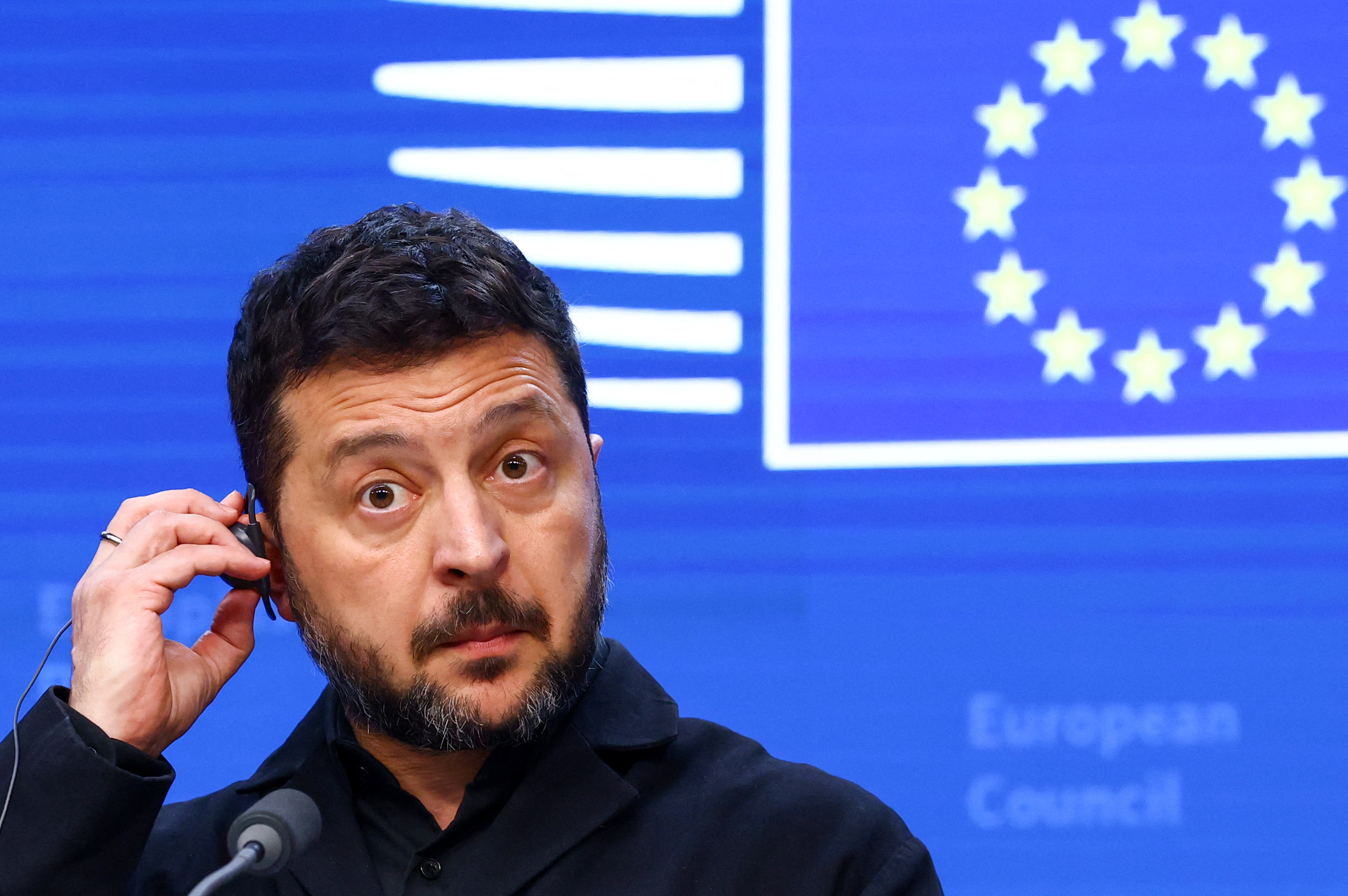 Ukrainian President Volodymyr Zelenskiy reacts during a press conference at a European Union leaders' summit in Brussels, Belgium, October 16, 2026. REUTERS/Yves Herman