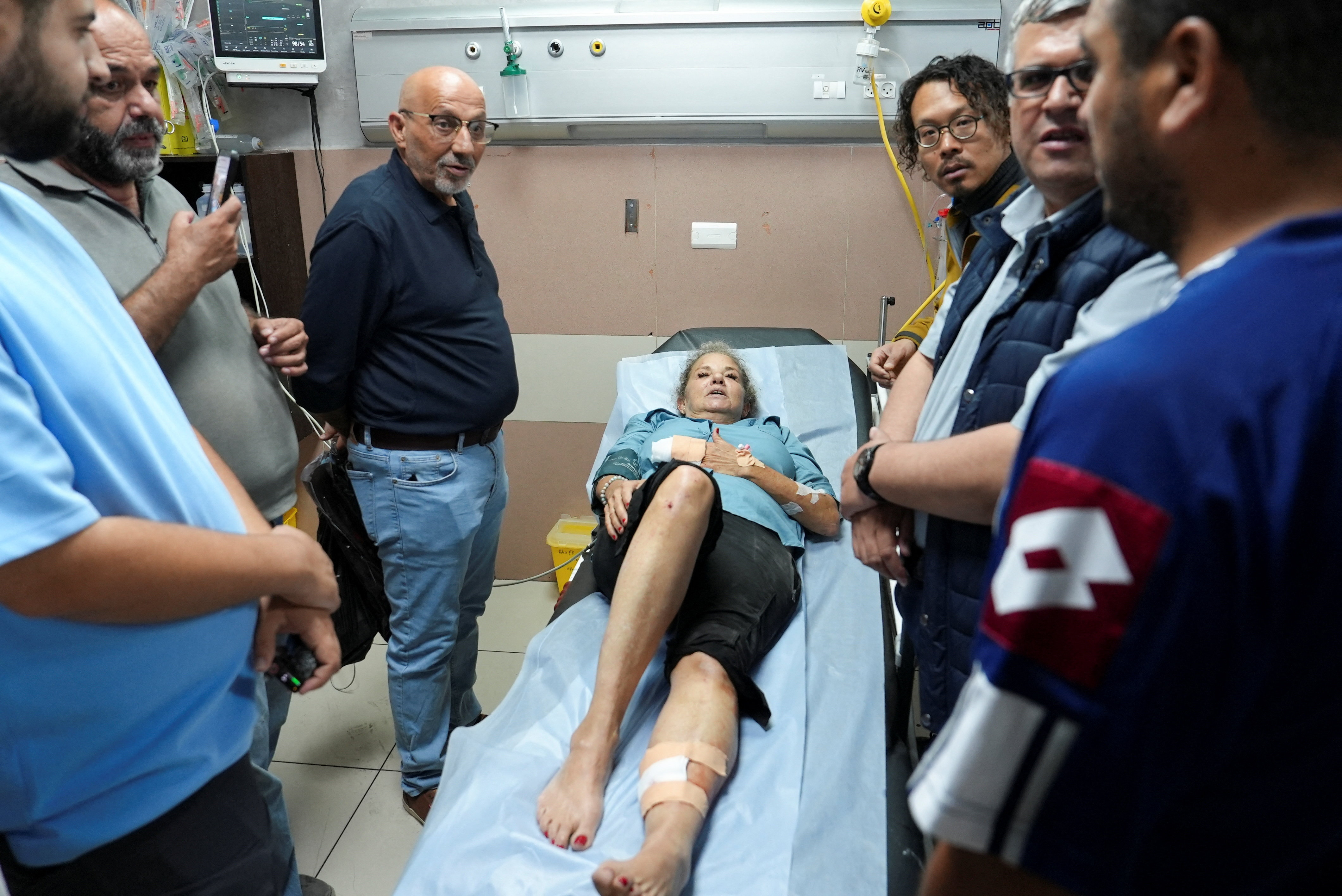 Heidi Levine, a photojournalist with the Washington Post, speaks to journalists at the hospital after sustaining multiple injuries during an attack by Israeli militant settlers on Palestinians harvesting olives, in Ramallah in the Israeli-occupied West Bank, October 16, 2026. REUTERS/Ali Sawafta
