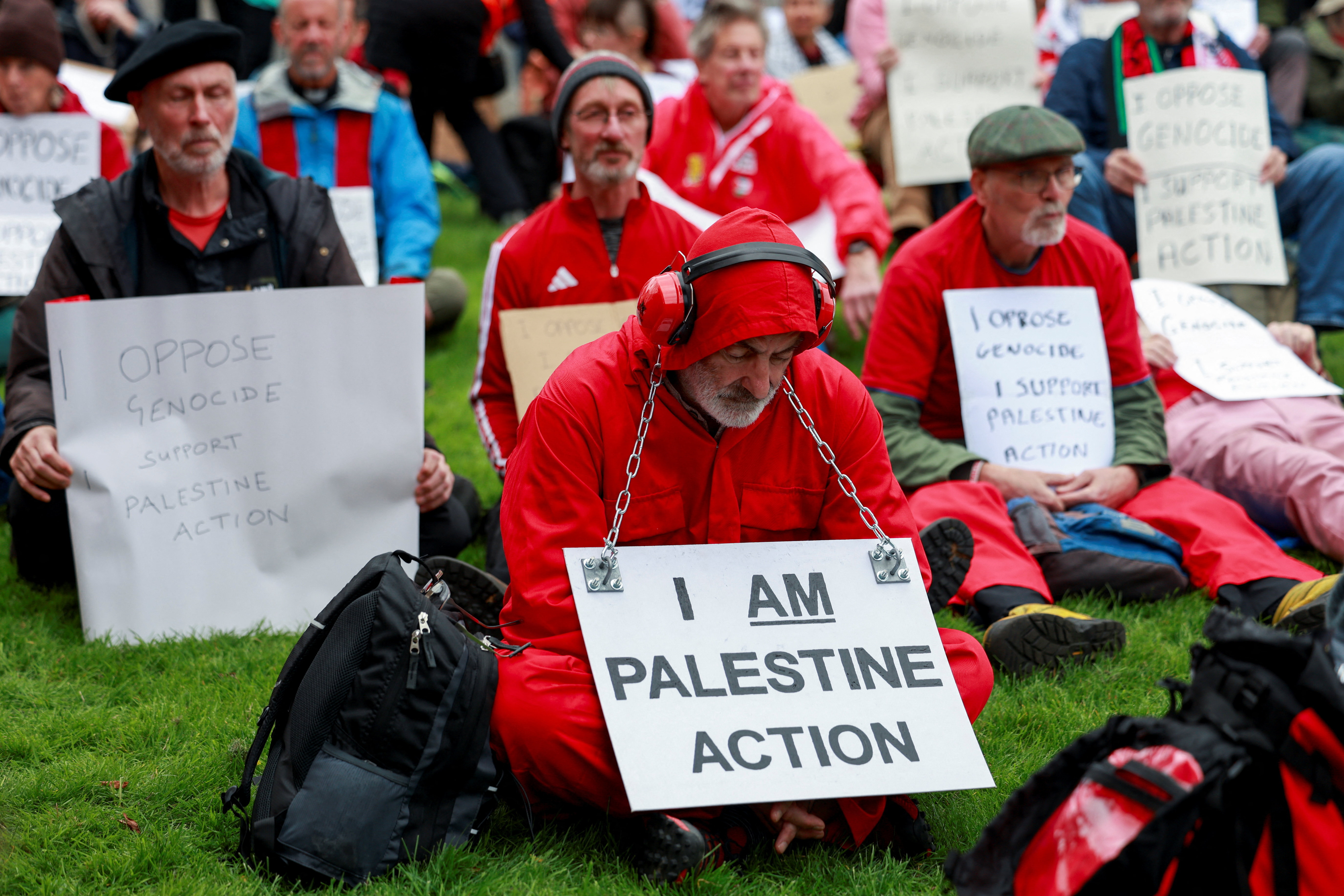 Campaigners from the Palestine Action Group display signs during a protest outside the venue of the Labour Party’s annual conference in Liverpool, Britain, September 27, 2026. REUTERS/Temilade Adelaja