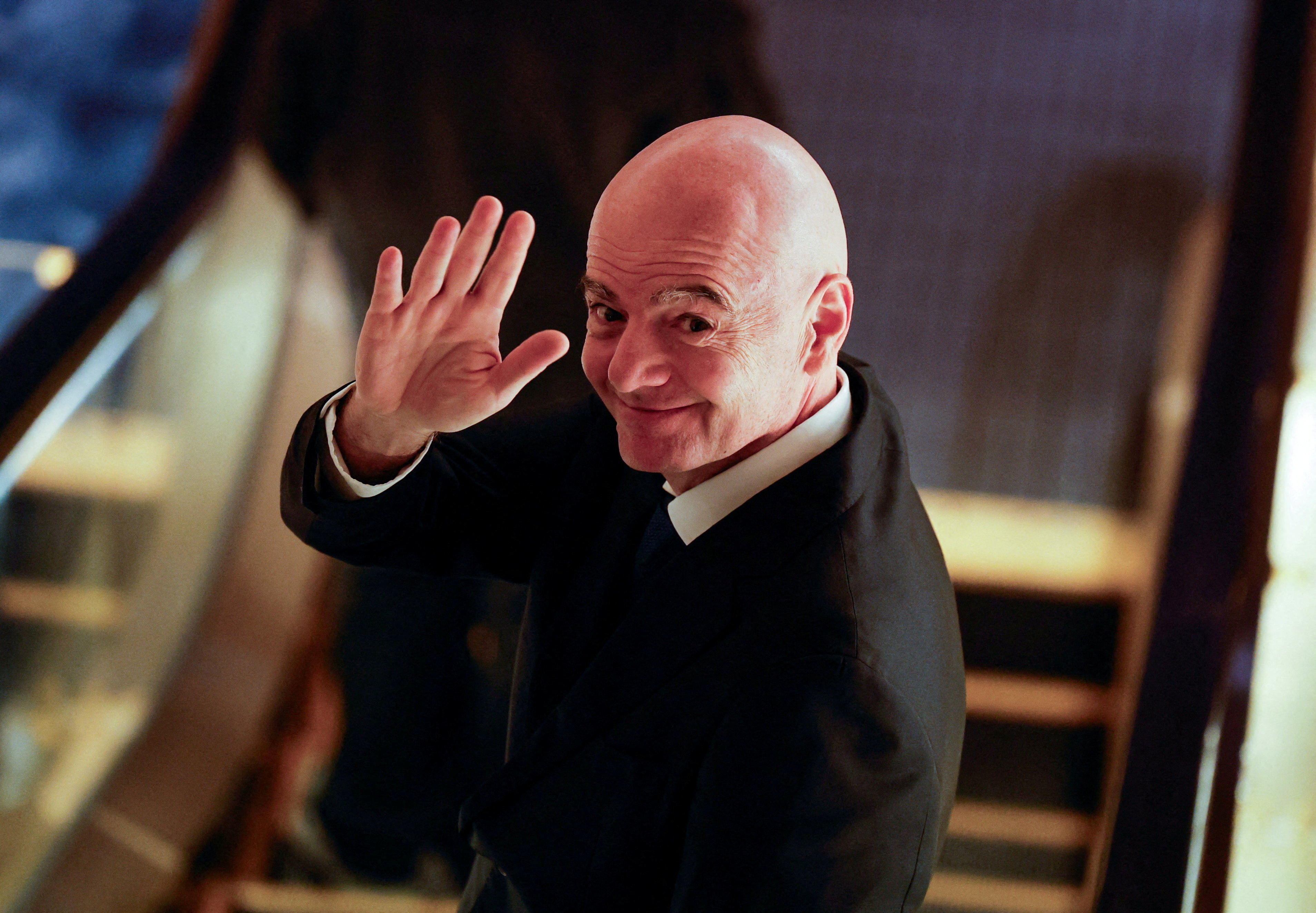 FILE PHOTO: FIFA president Gianni Infantino gestures to reporters as he leaves from a venue for the Asian Football Confederation (AFC)'s extraordinary congress in Tokyo, Japan, October 23, 2026. REUTERS/Kim Kyung-Hoon/File Photo