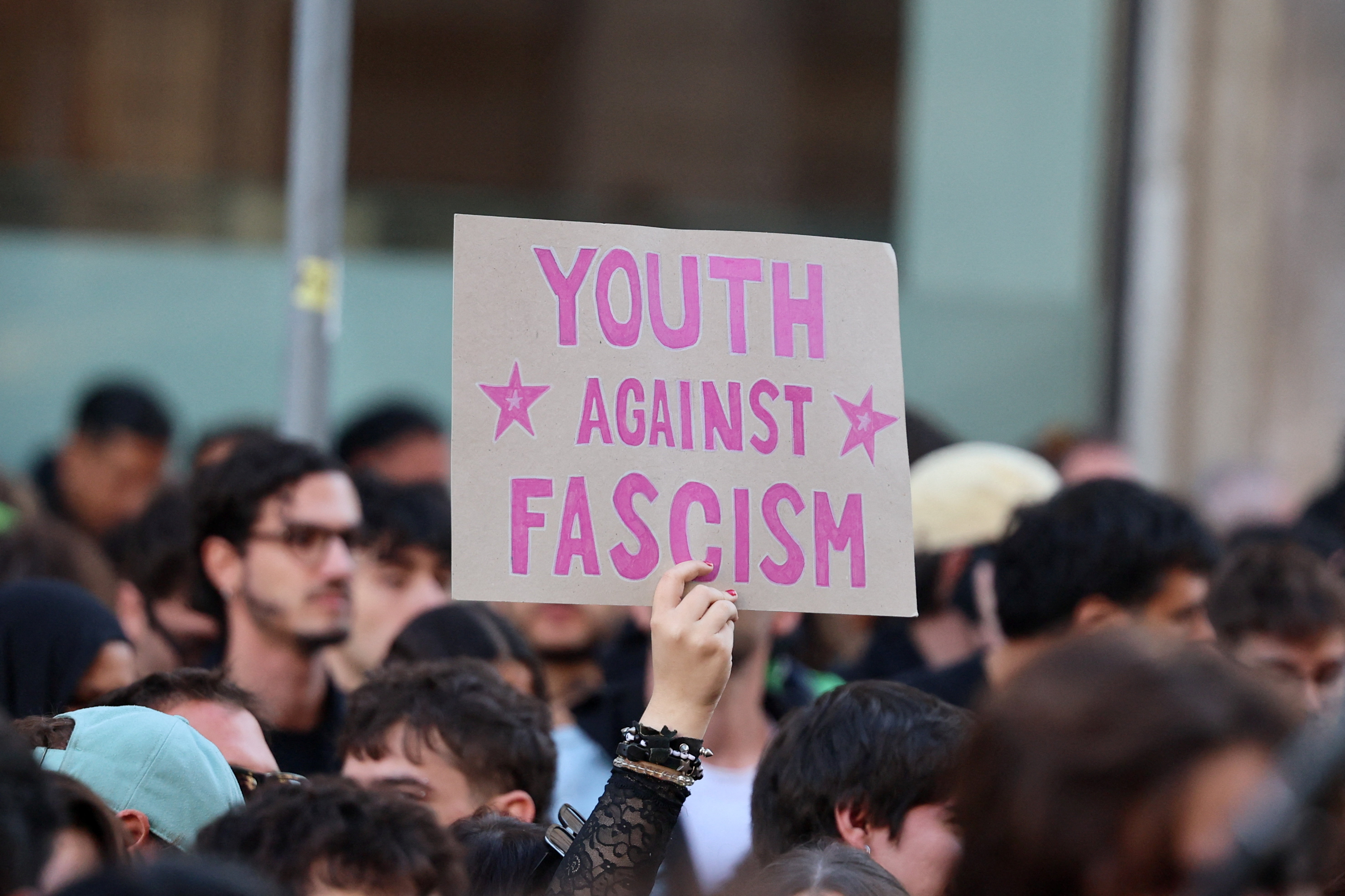 People attend a spontaneous demonstration against the rising cost of living, a week after protests ended in clashes and looting in northern cities, in Milan, Italy October 24, 2026. REUTERS/Yara Nardi
